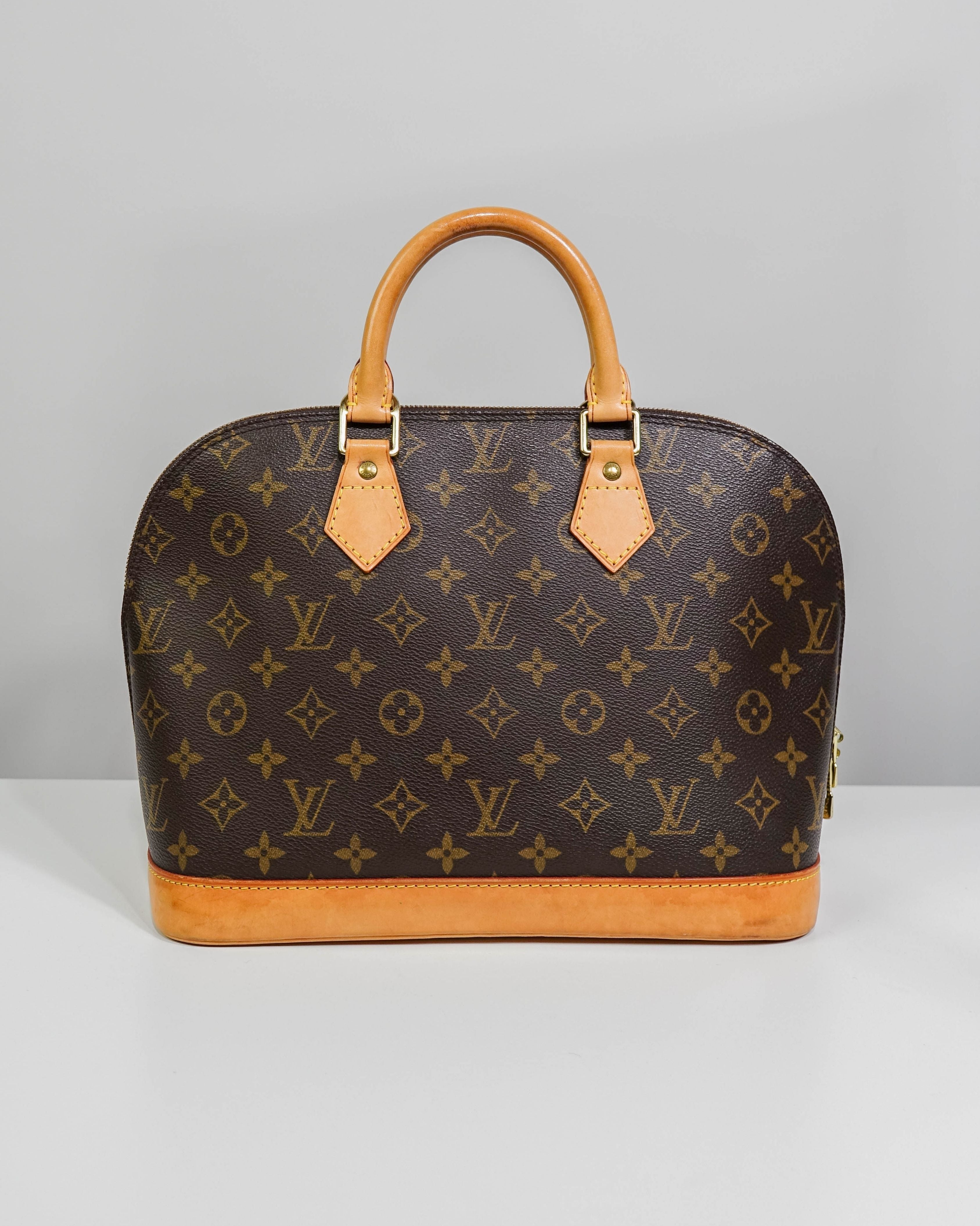 Sac à mains Alma Louis Vuitton en toile Monogram Lola Collective