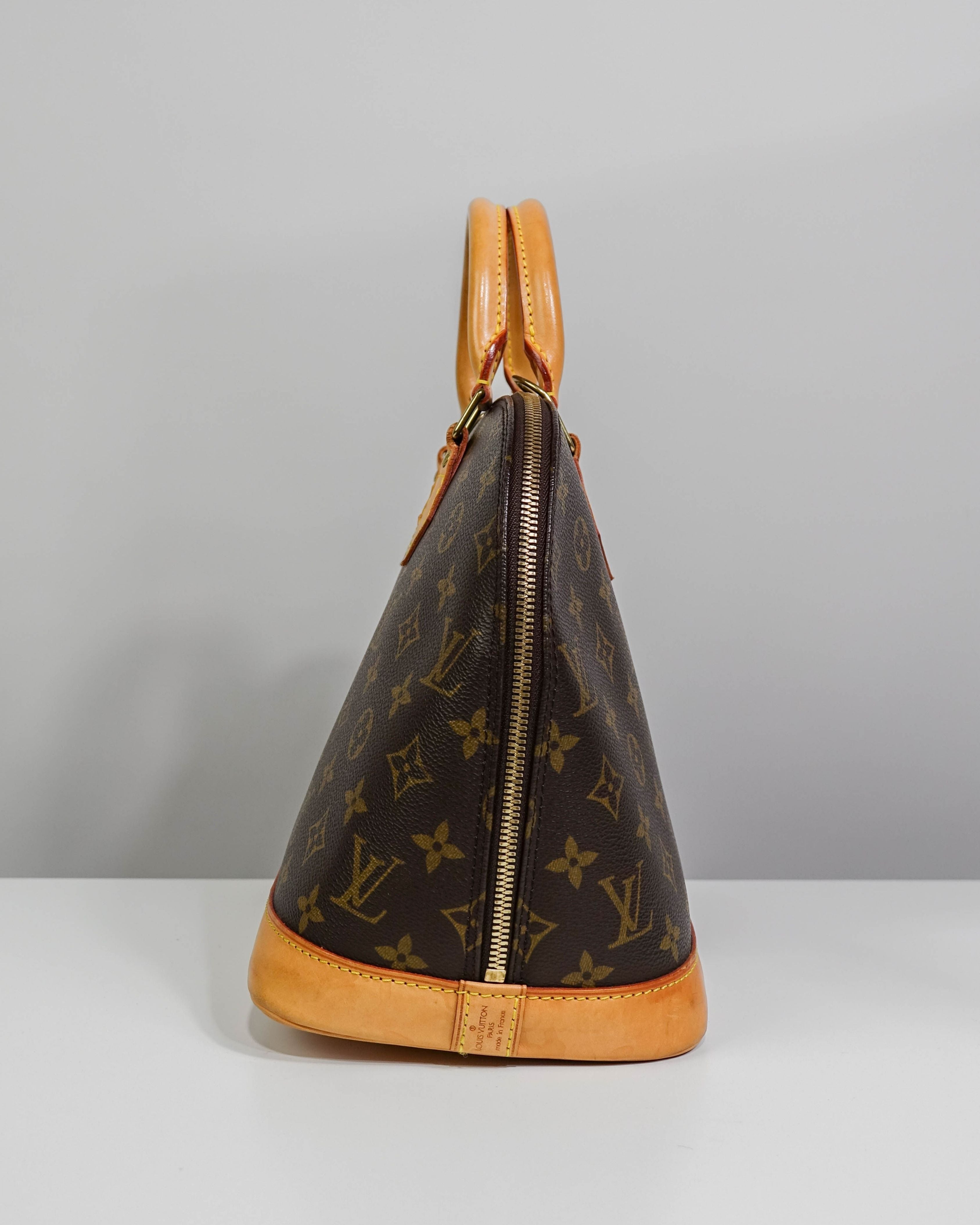 Sac à mains Alma Louis Vuitton en toile Monogram Lola Collective
