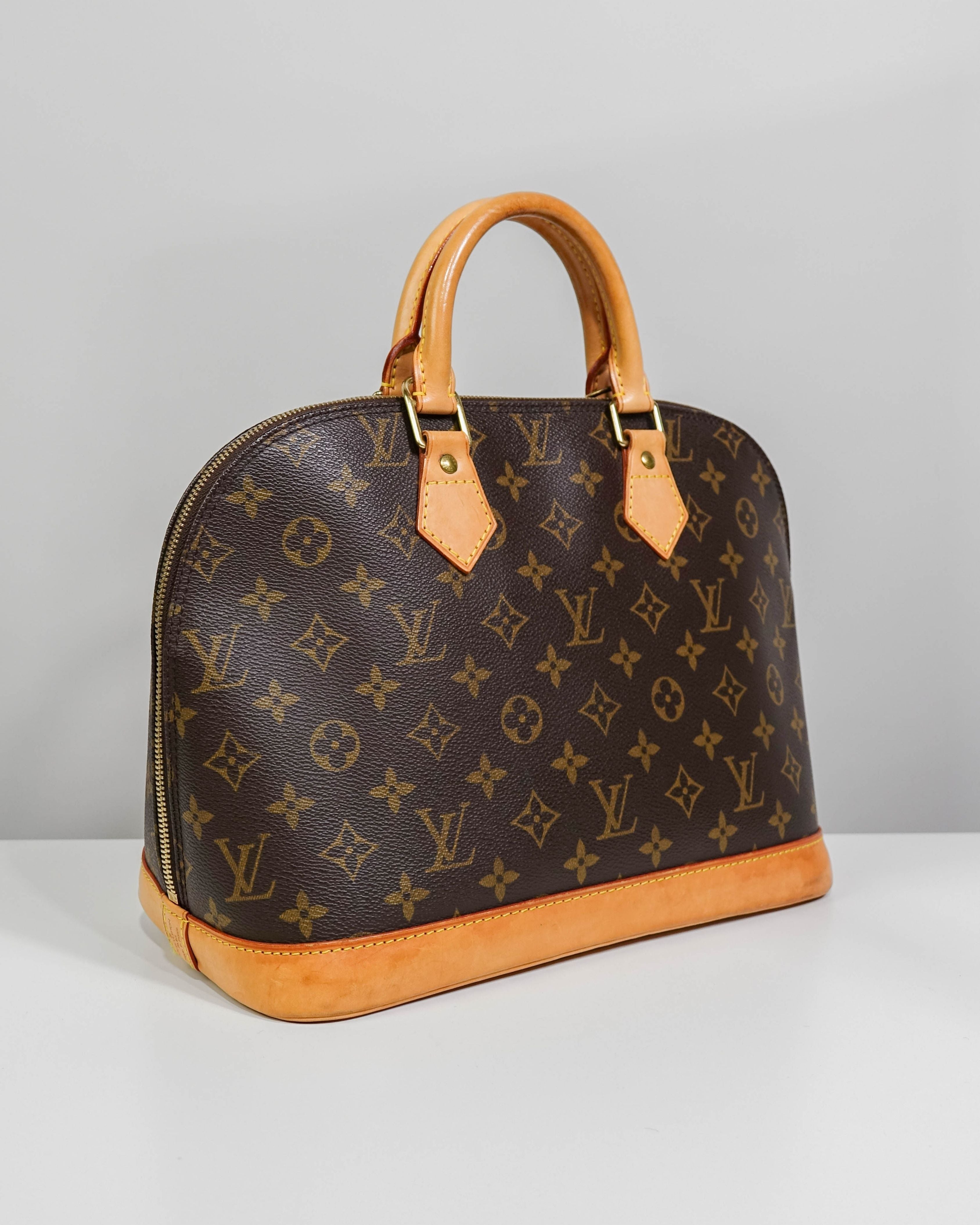 Sac à mains Alma Louis Vuitton en toile Monogram Lola Collective