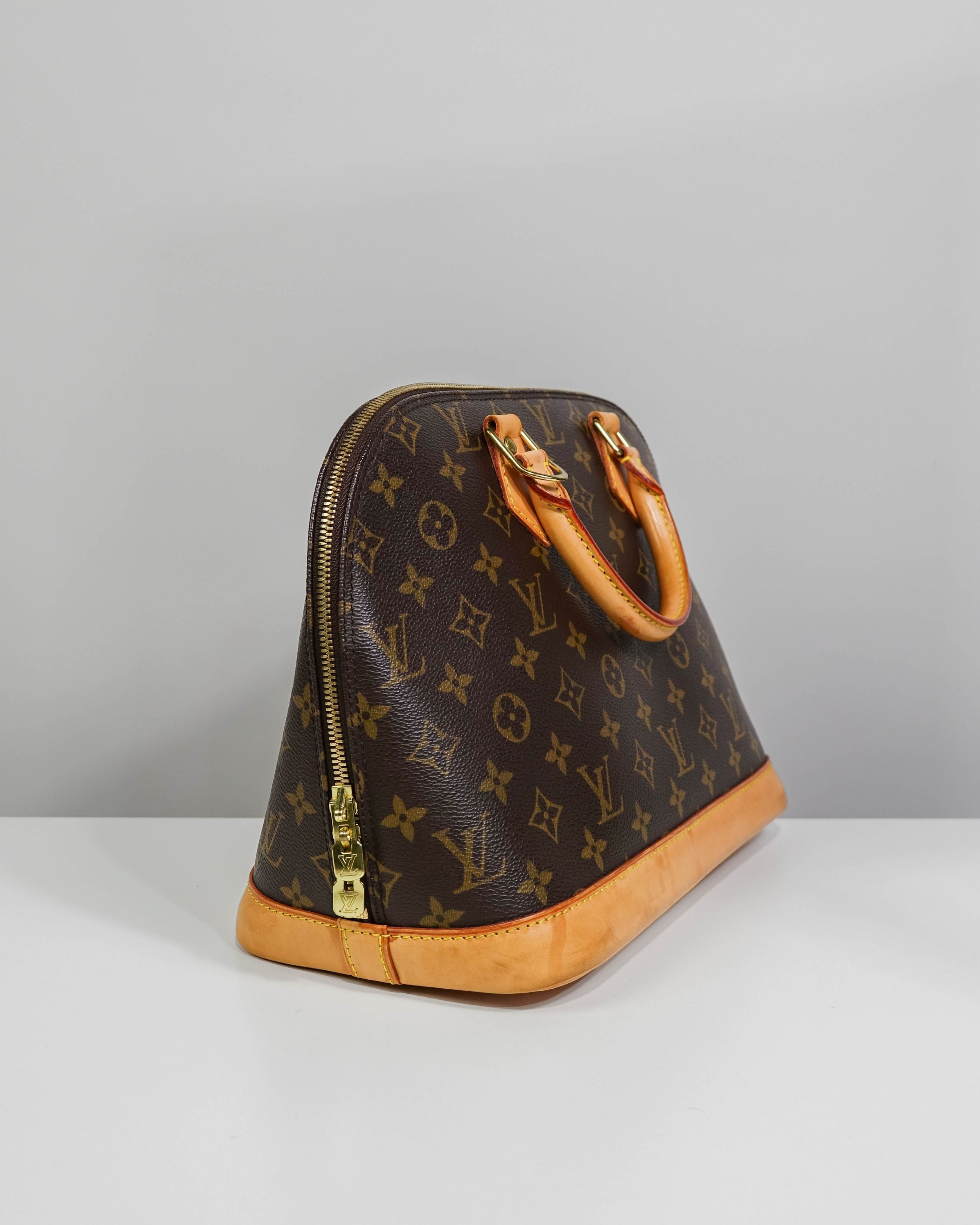 Sac à mains Alma Louis Vuitton en toile Monogram Lola Collective