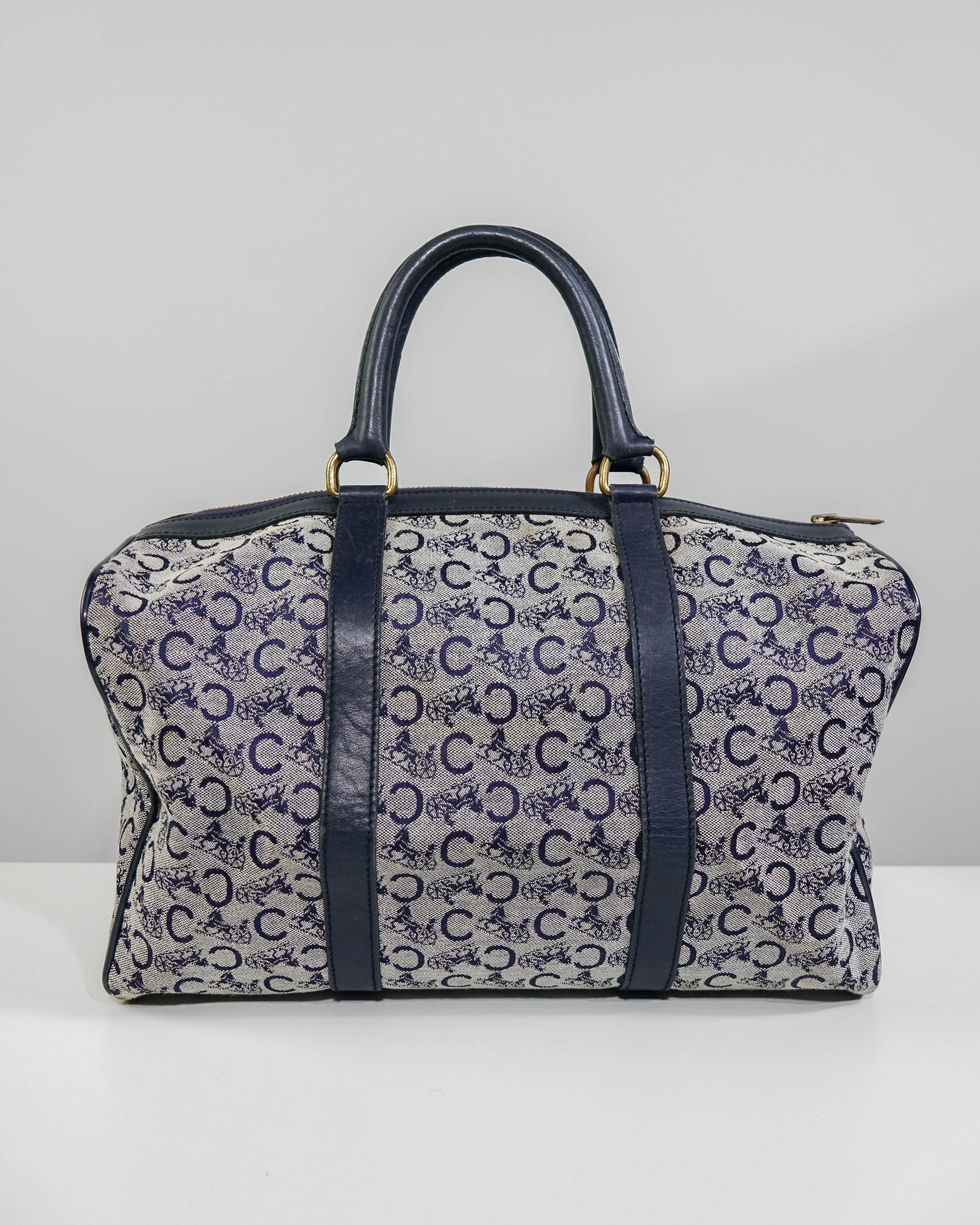 Sac Boston Céline en toile bleu C macadam Lola Collective