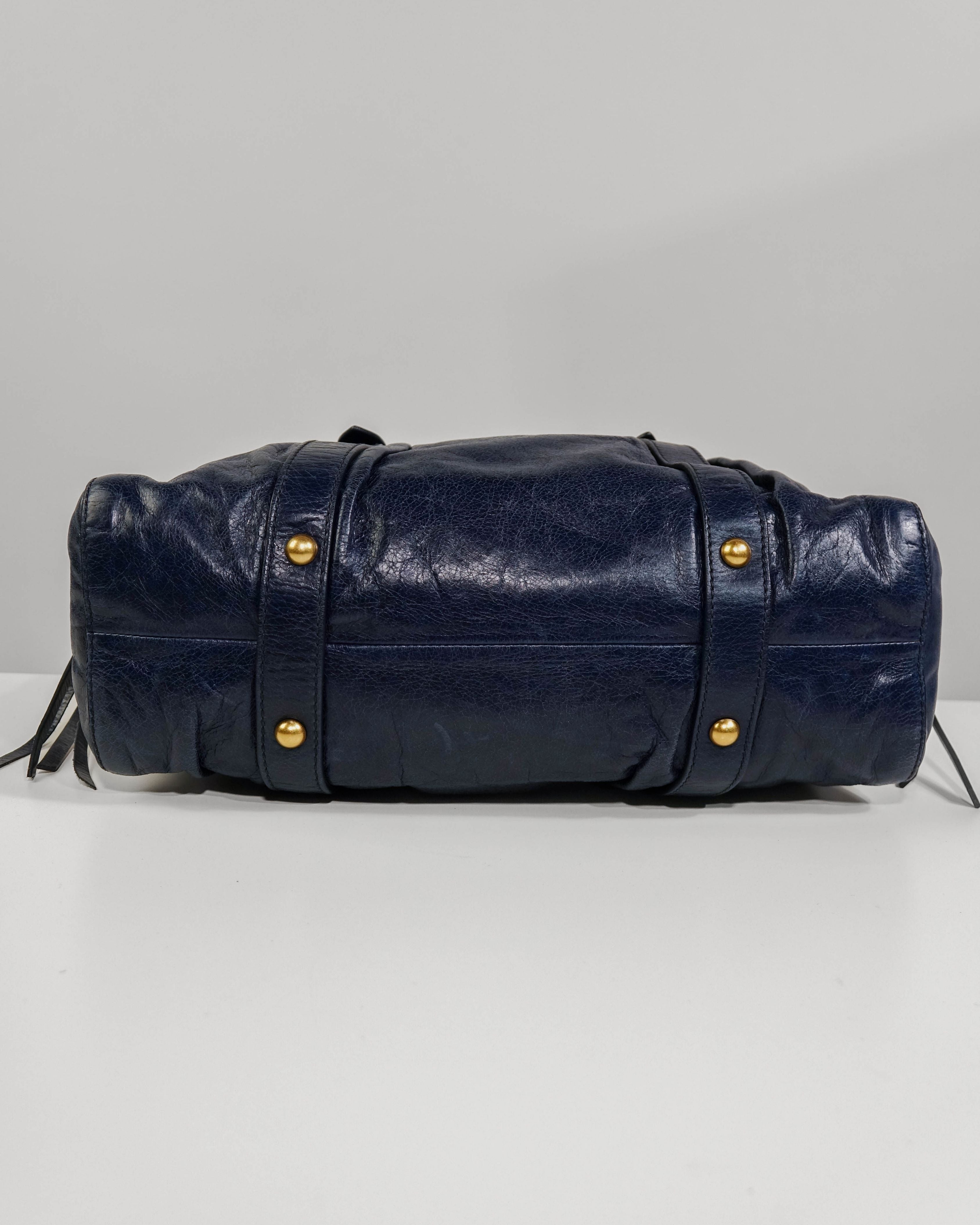 Sac 2way Miu Miu - bleu et gold Lola Collective