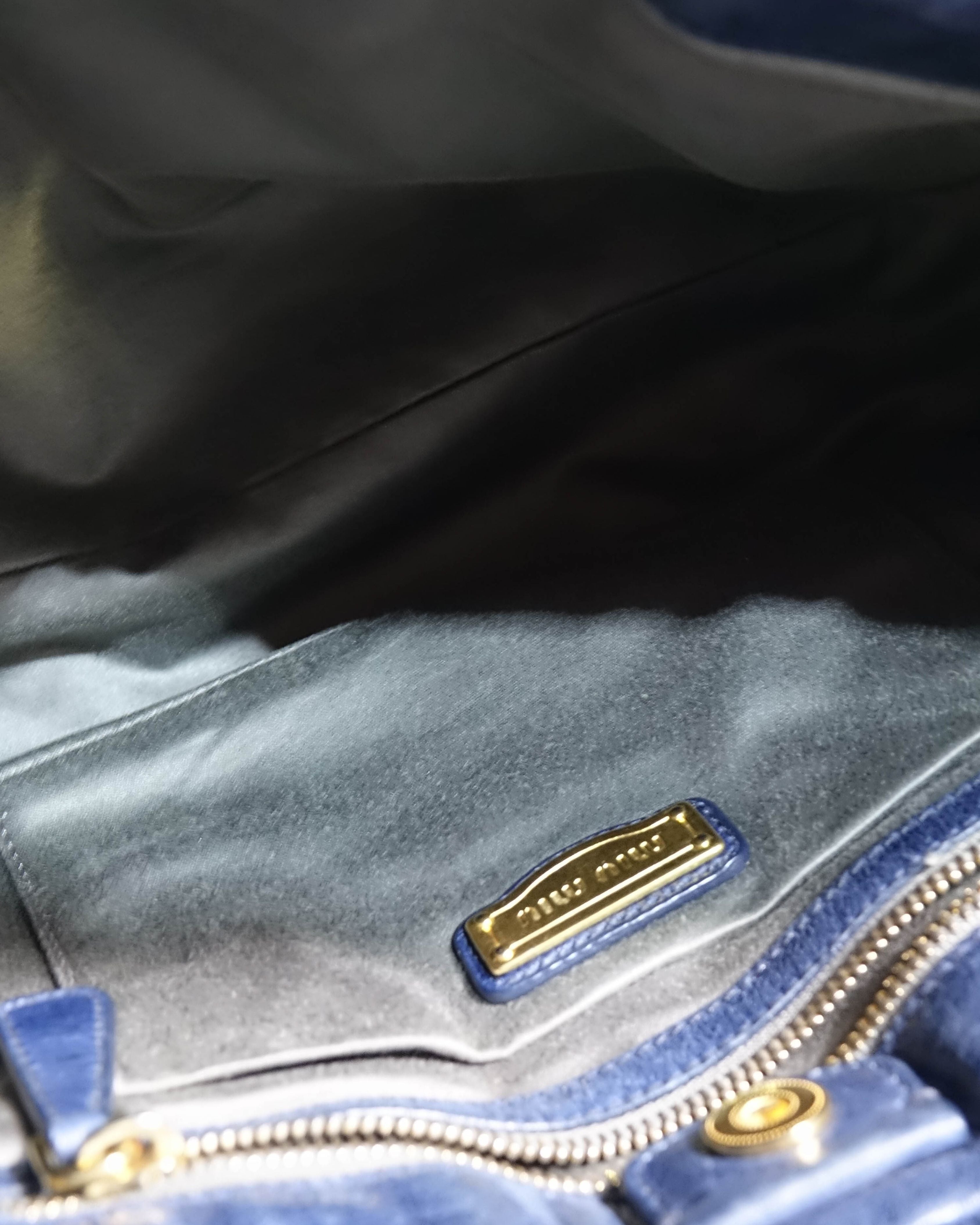 Sac 2way Miu Miu - bleu et gold Lola Collective