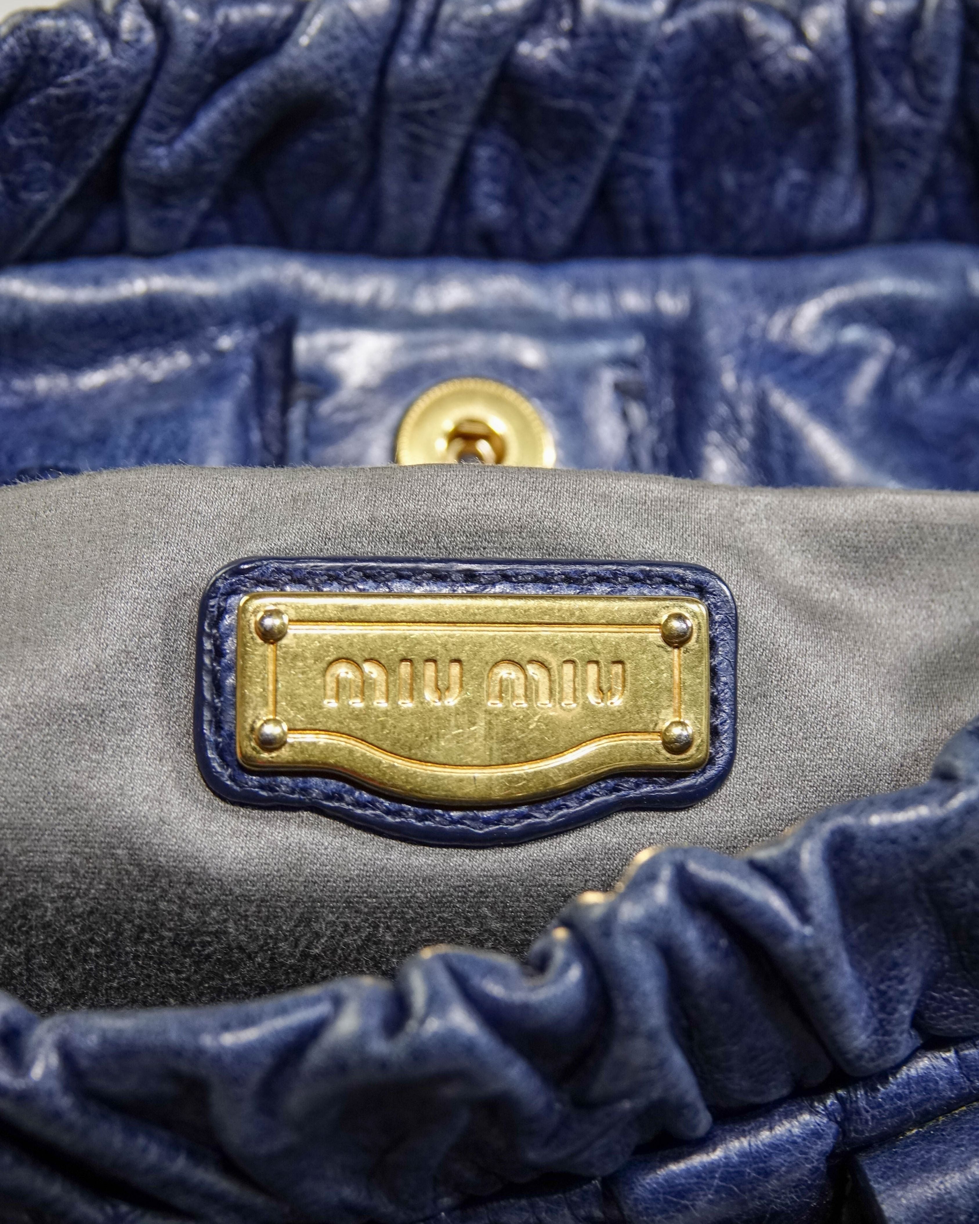 Sac 2way Miu Miu - bleu et gold Lola Collective
