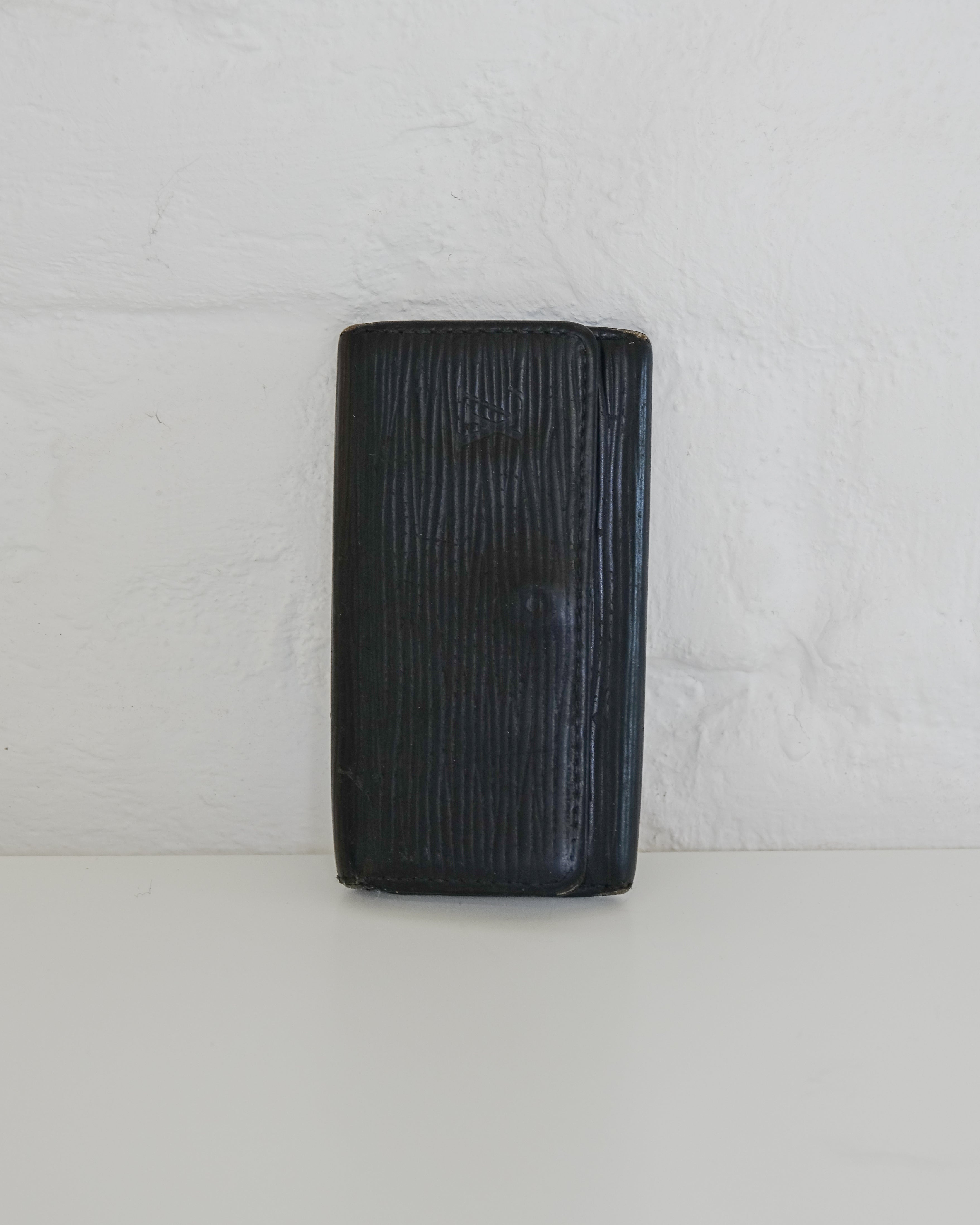 Louis Vuitton Porte carte cuir noir Lola collective