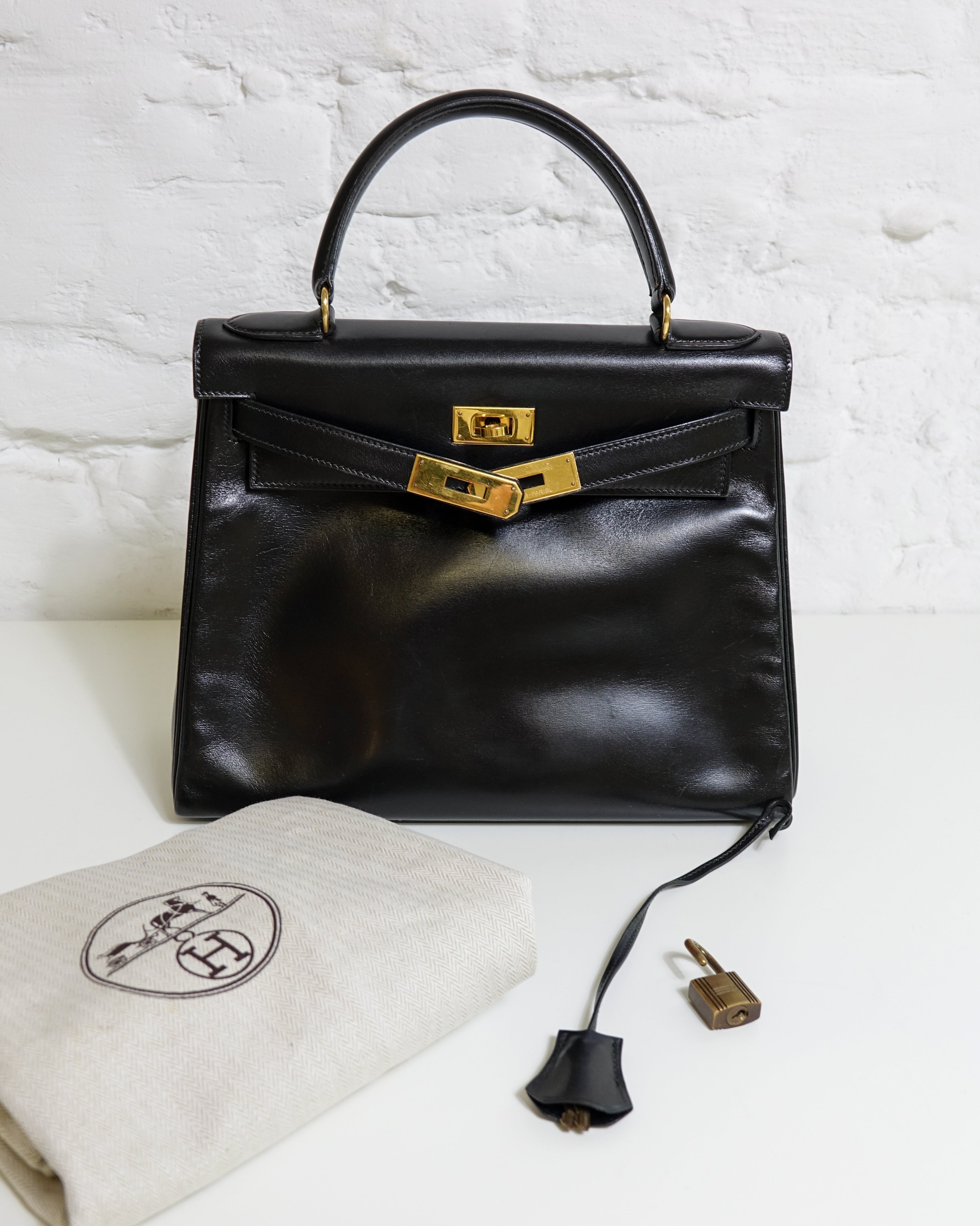 Hermès Kelly 28 Noir box Lola Collective