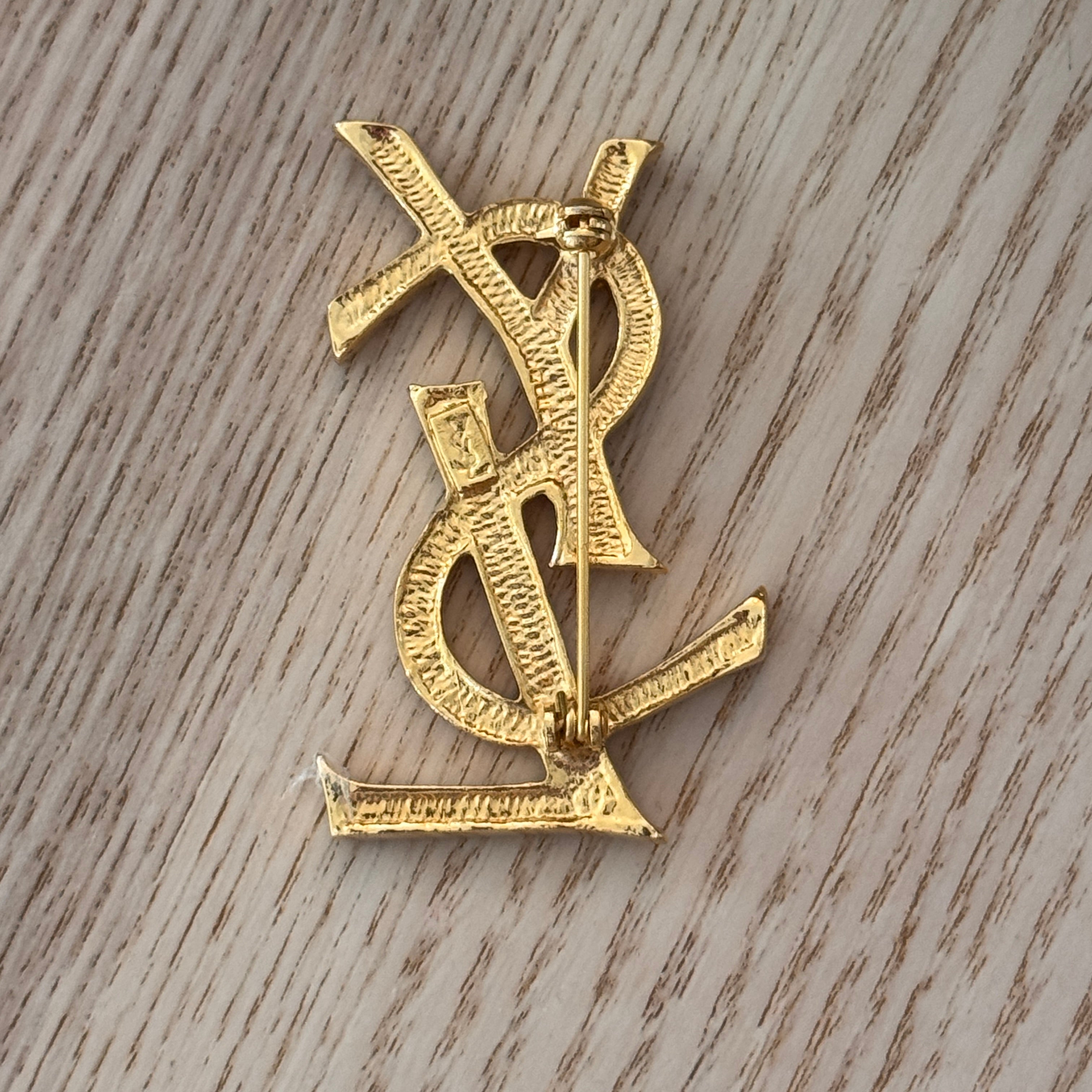 Yves Saint Laurent Broche strass et gold Lola Collective