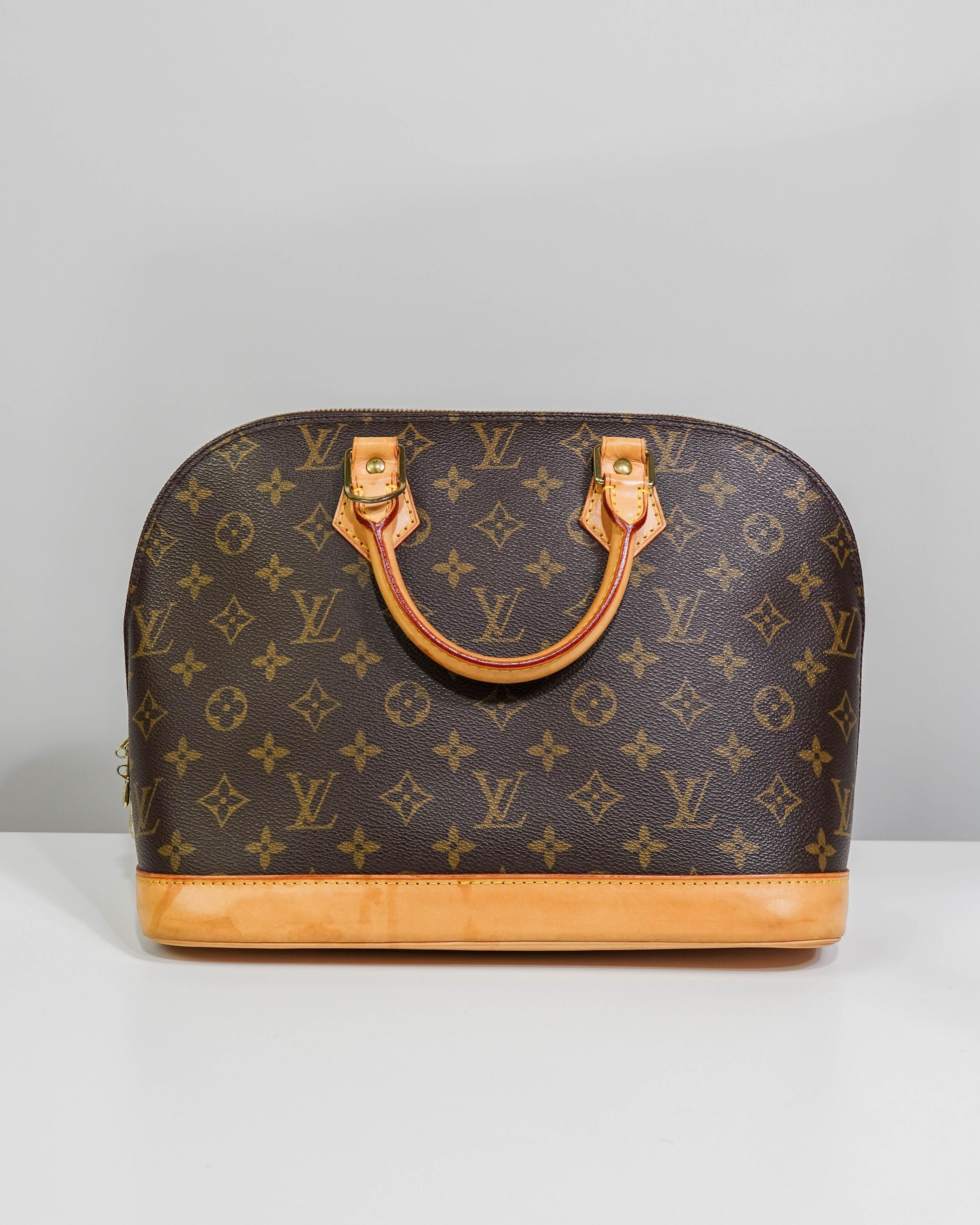 Sac à mains Alma Louis Vuitton en toile Monogram Lola Collective