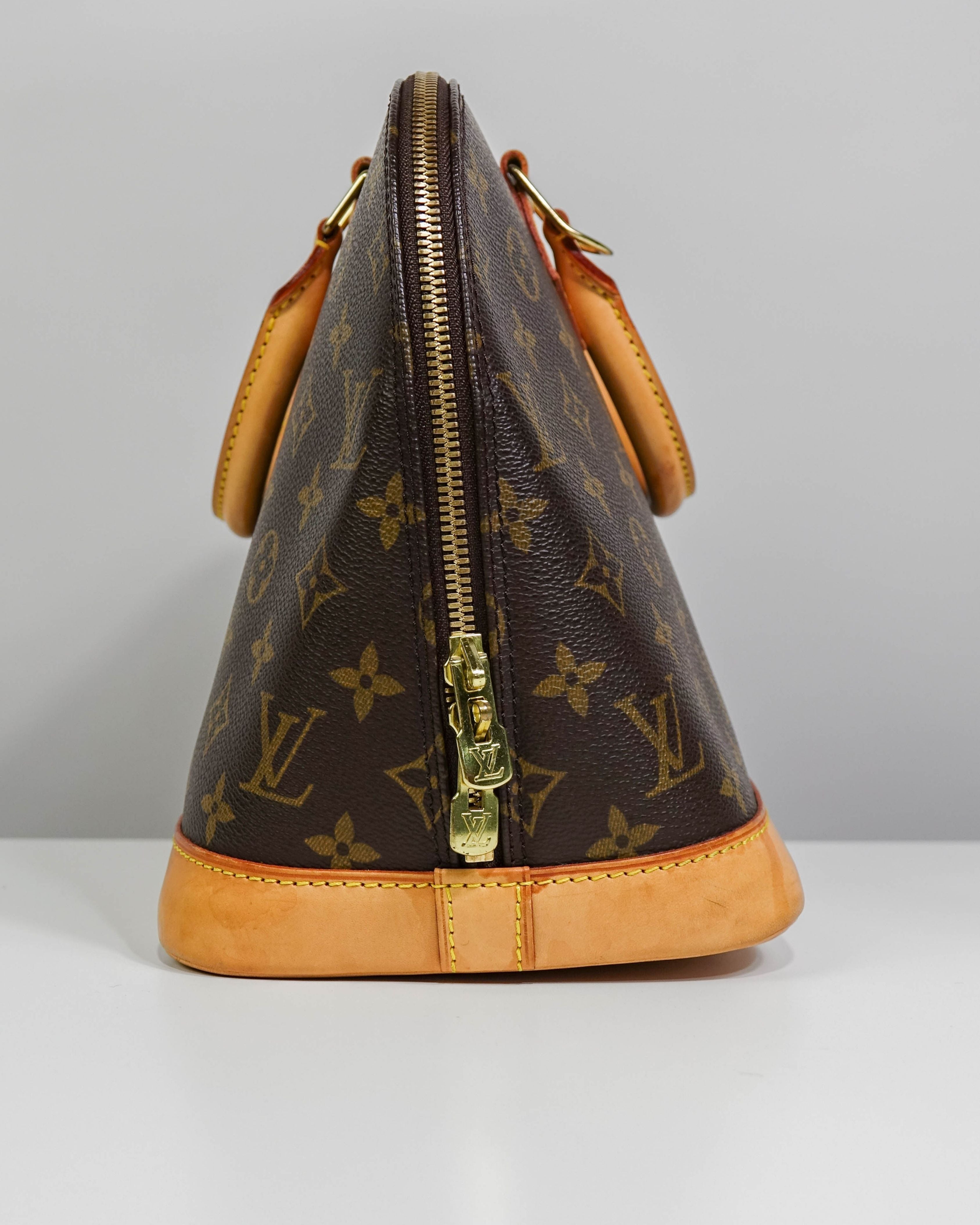 Sac à mains Alma Louis Vuitton en toile Monogram Lola Collective