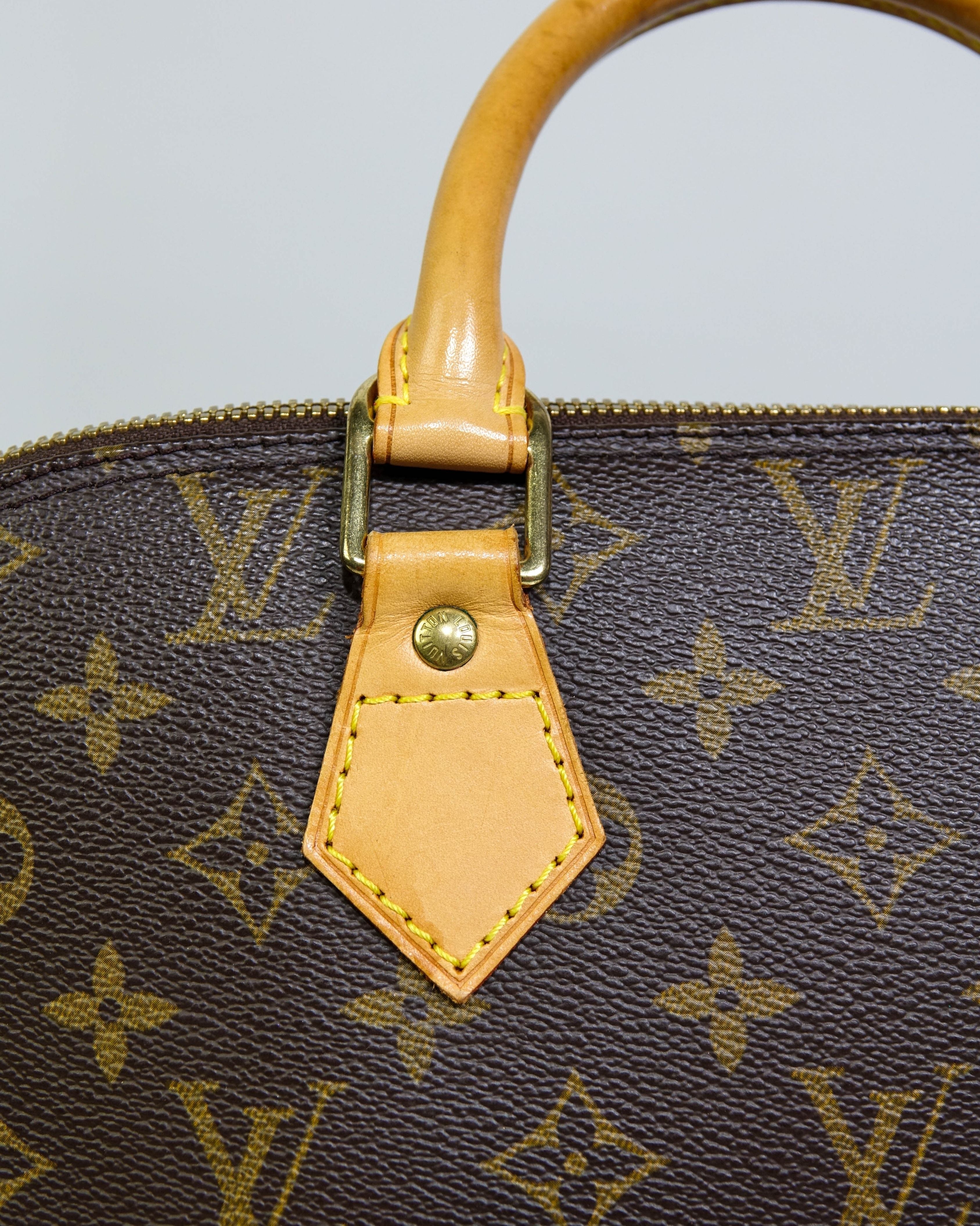 Sac à mains Alma Louis Vuitton en toile Monogram Lola Collective