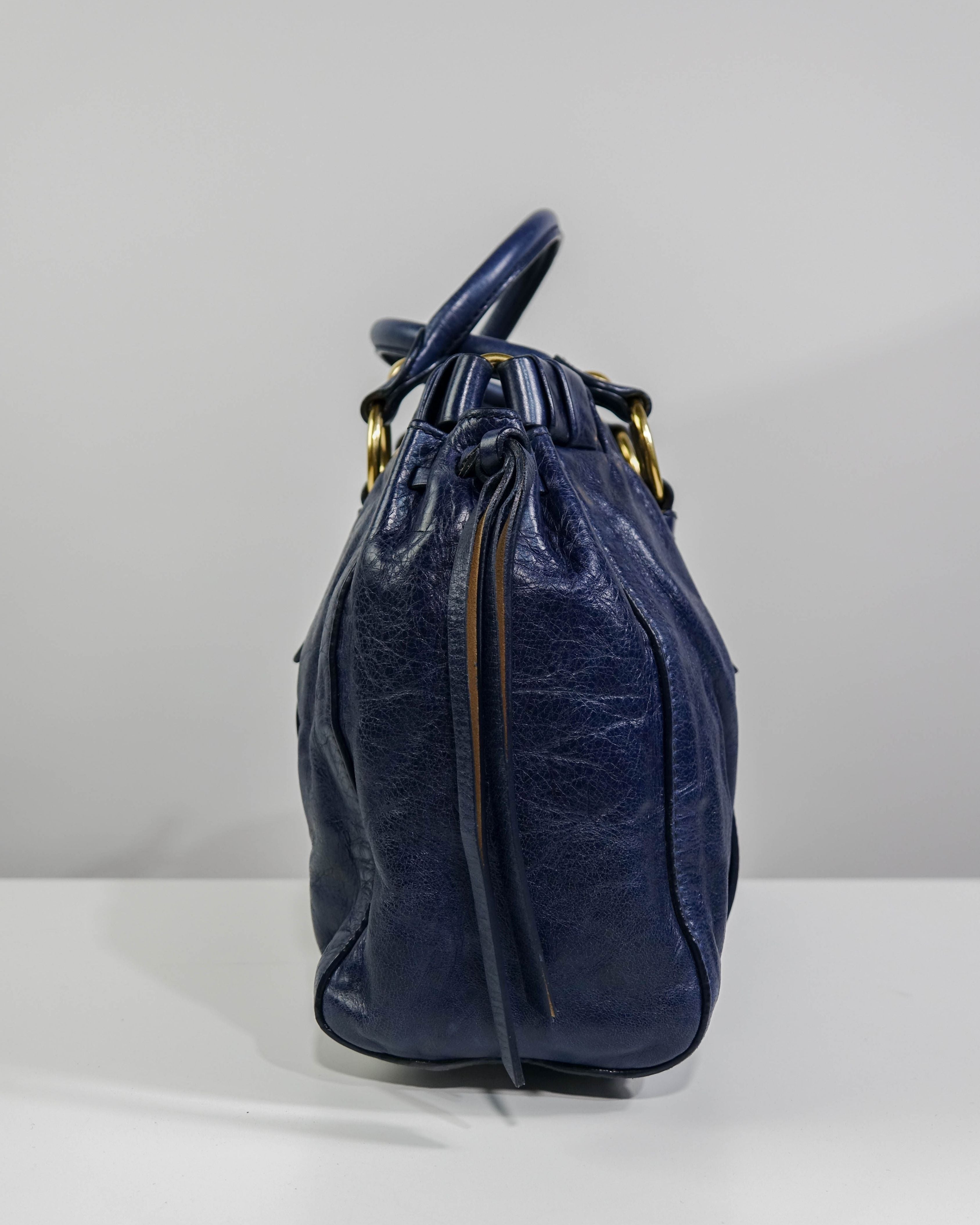 Sac 2way Miu Miu - bleu et gold Lola Collective