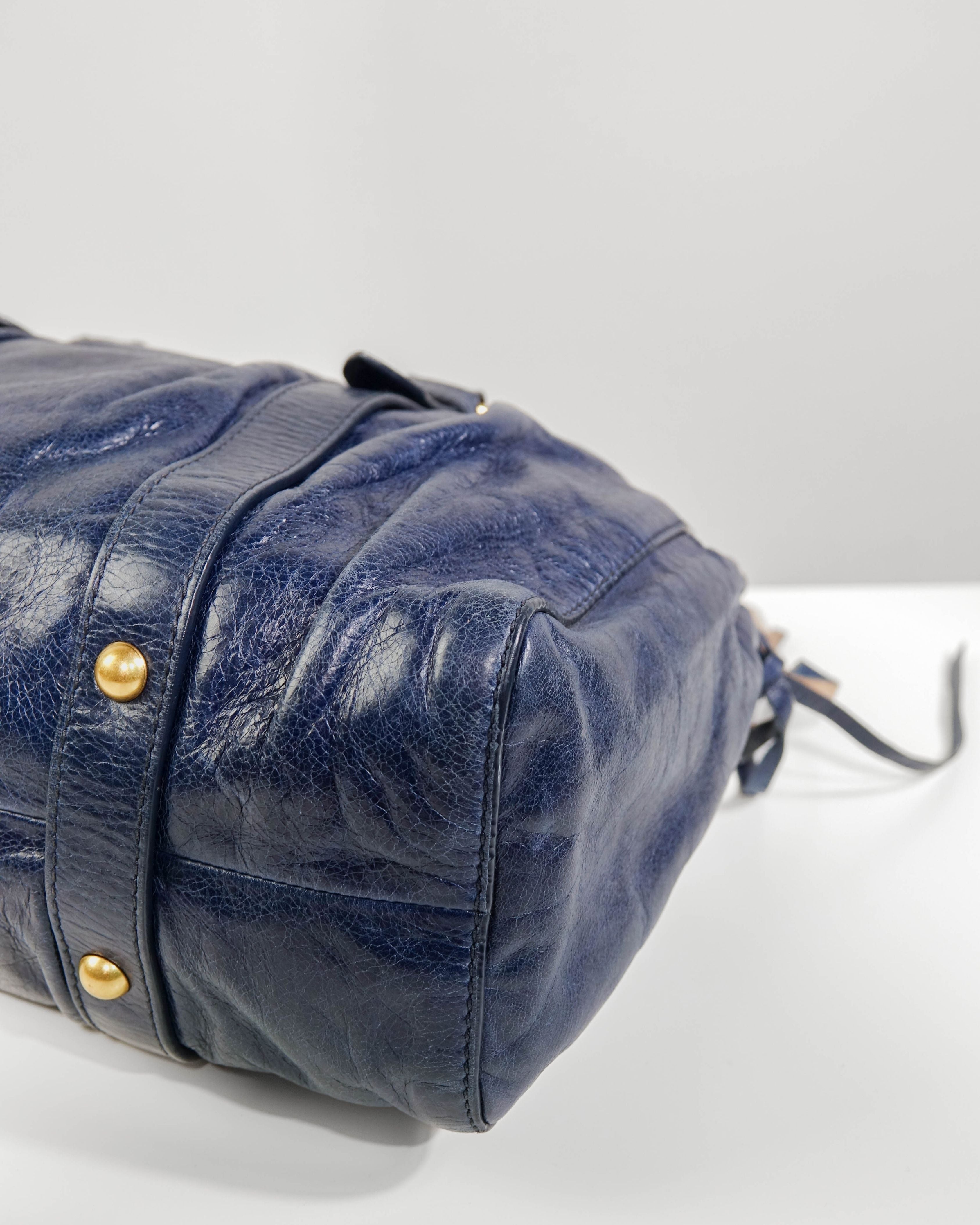 Sac 2way Miu Miu - bleu et gold Lola Collective