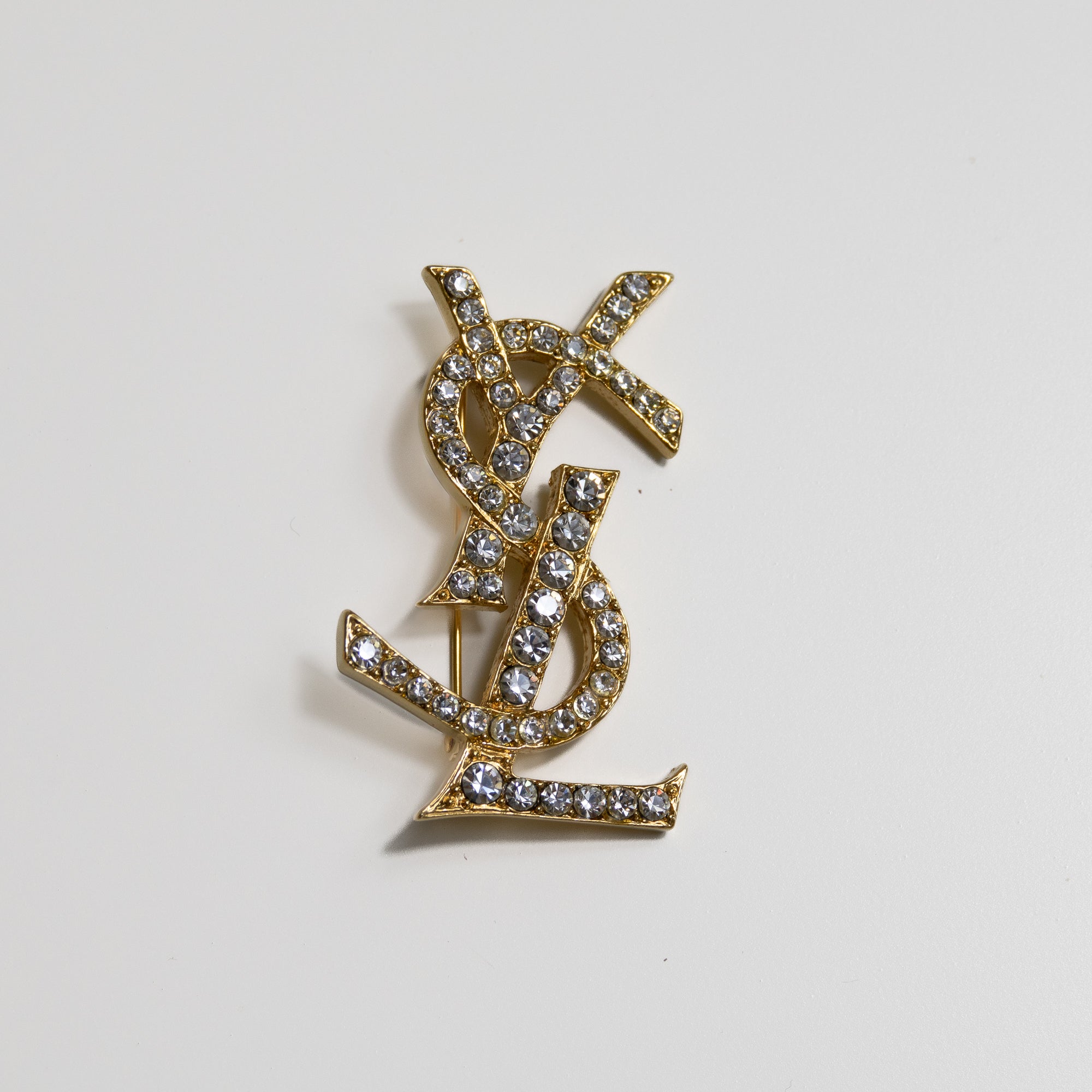 Yves Saint Laurent Broche strass et gold Lola Collective