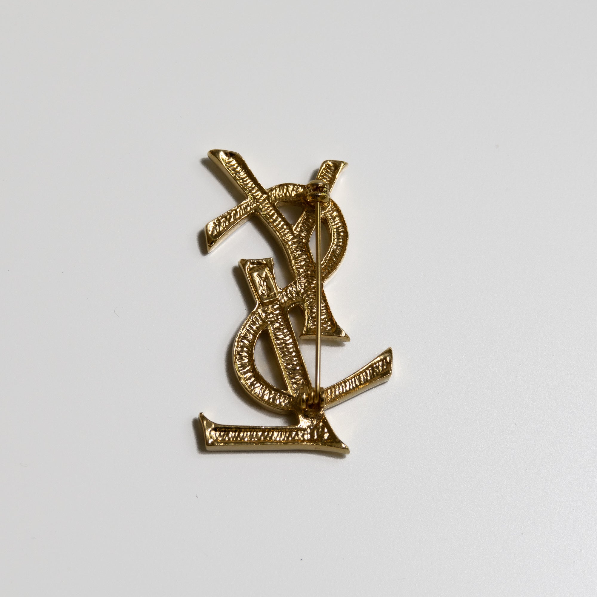 Yves Saint Laurent Broche strass et gold Lola Collective