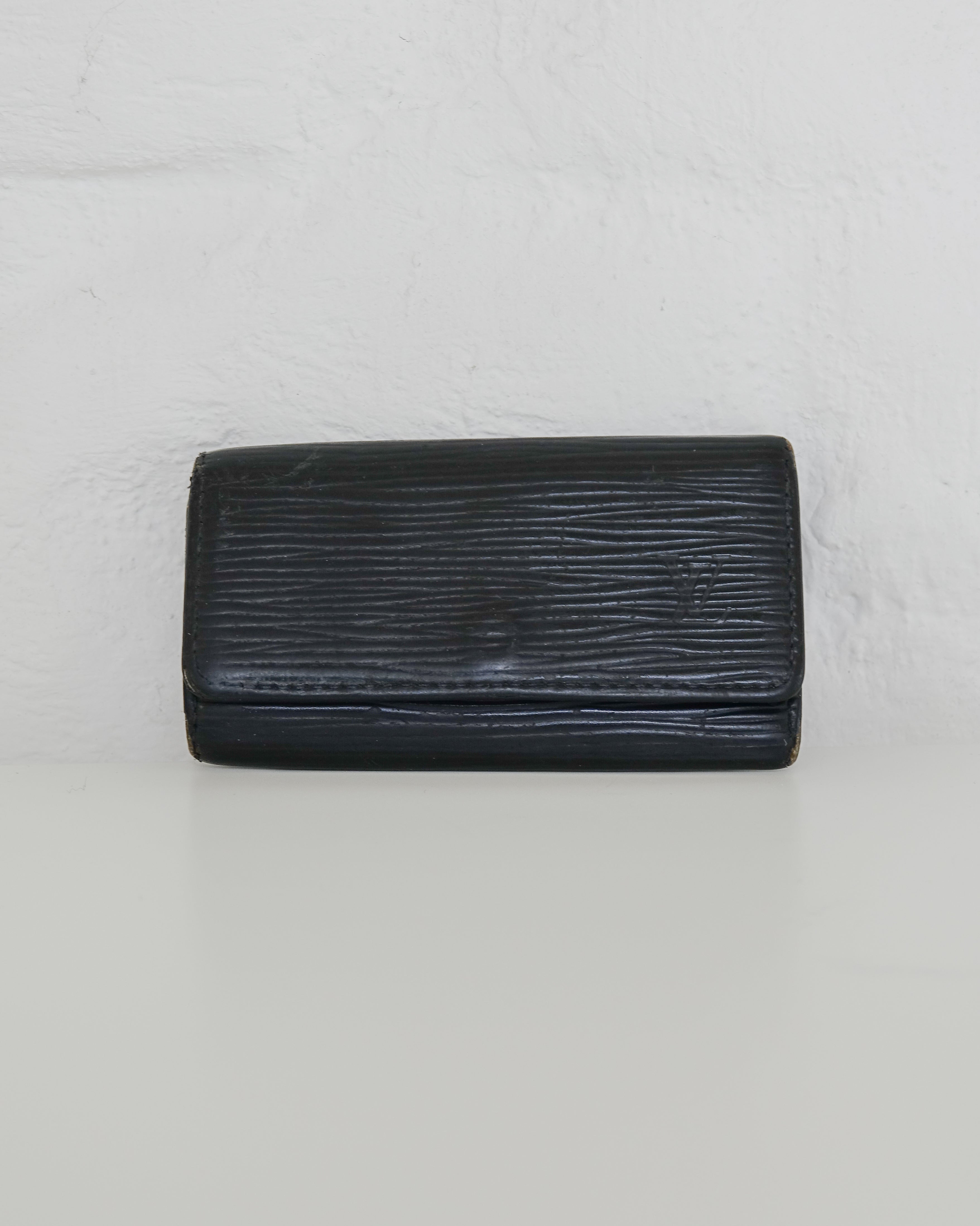 Louis Vuitton Porte carte cuir noir Lola collective