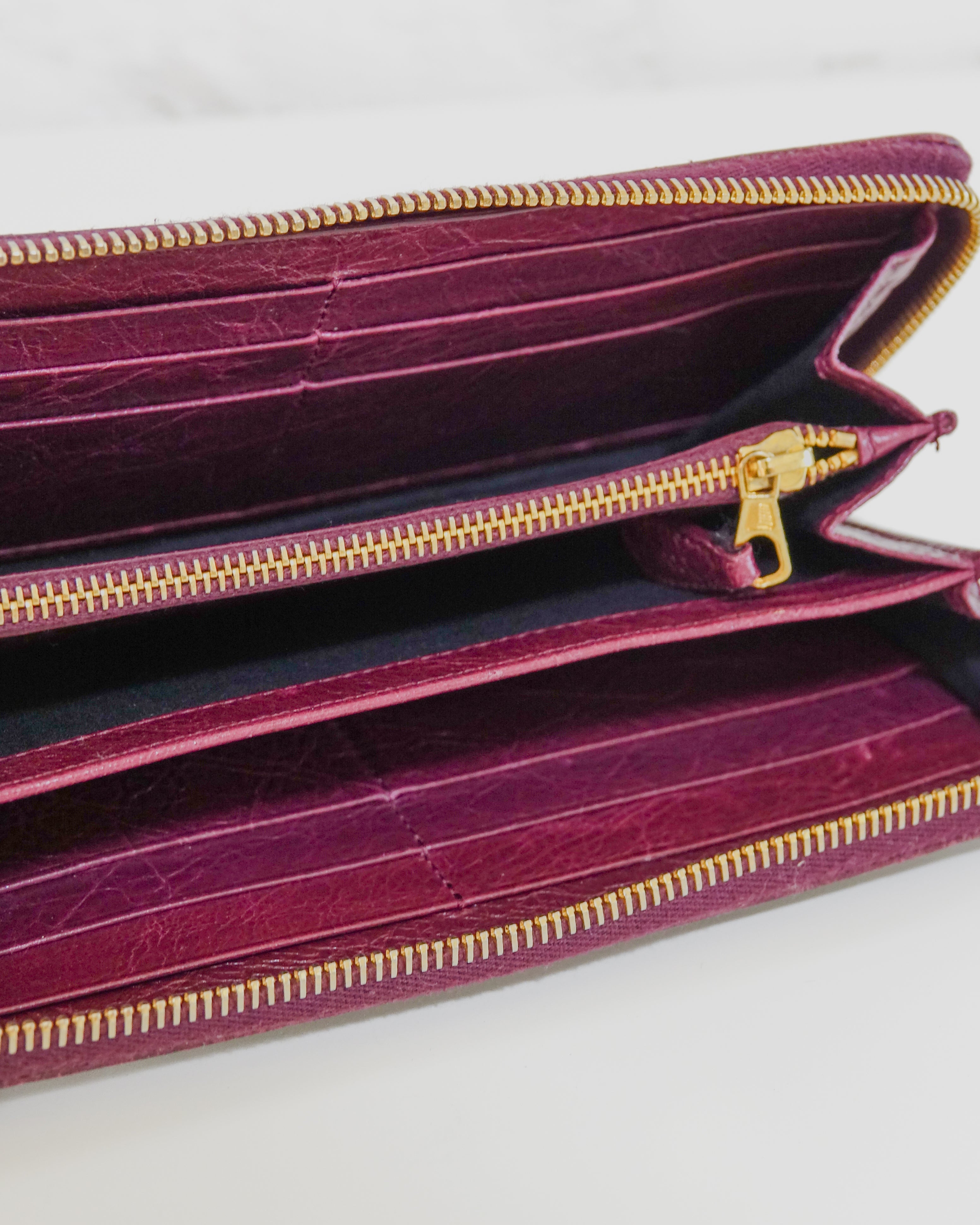 Balanciaga portefeuille mauve Lola Collective