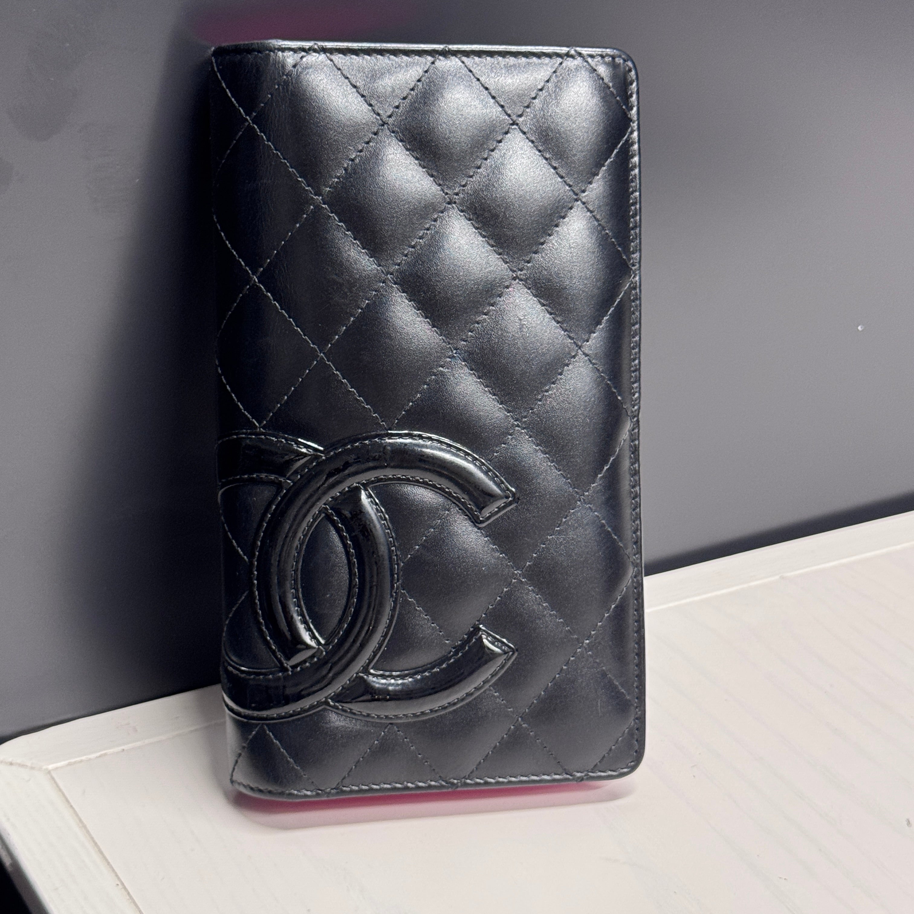 Chanel portefeuille long agneau noir et double c Lola Collective